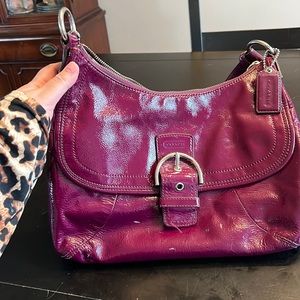 Rich purple authentic Coach handbag.